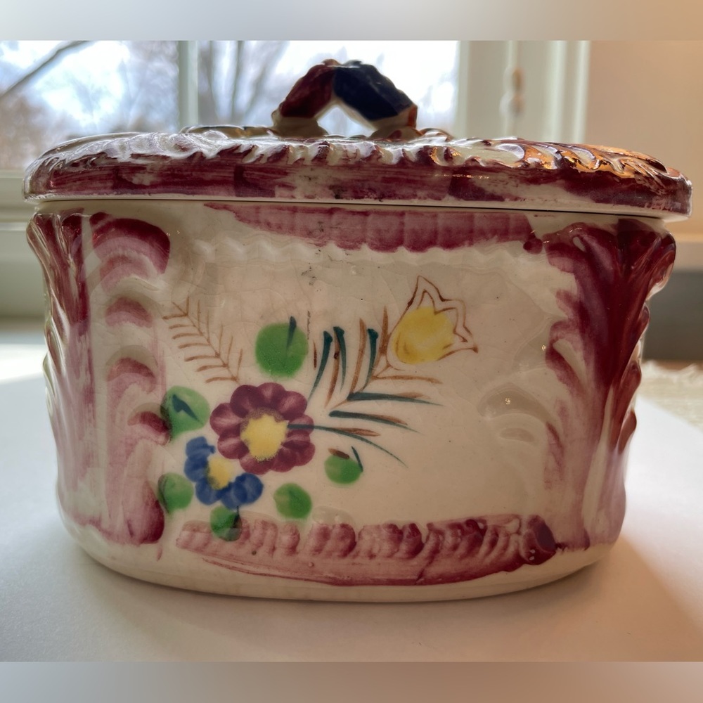 Vintage handpainted ceramic covered oval box.